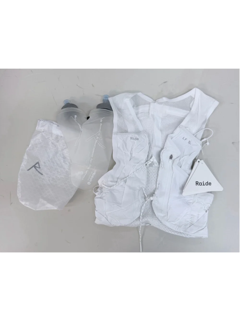New with tags RAIDE LF 5L Trail Running Vest White Sz Extra Small!